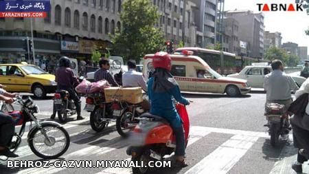 دختر موتور سوار در خیابان انقلاب تهران